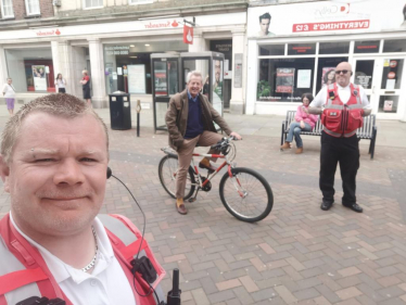 Richard on bike with CPOs